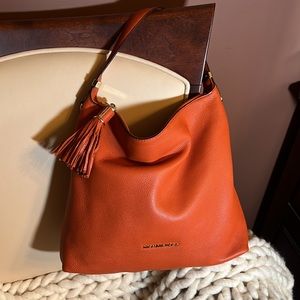 Michael Kors large Bedford Large Tassel zip top hobo crossbody in burnt orange